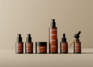 A group of bottles of different types of skin care