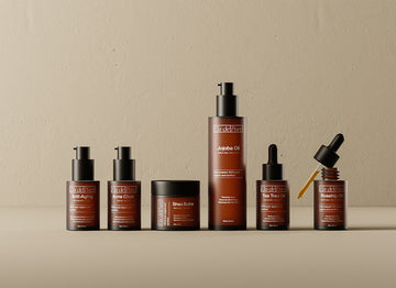 A group of bottles of different types of skin care